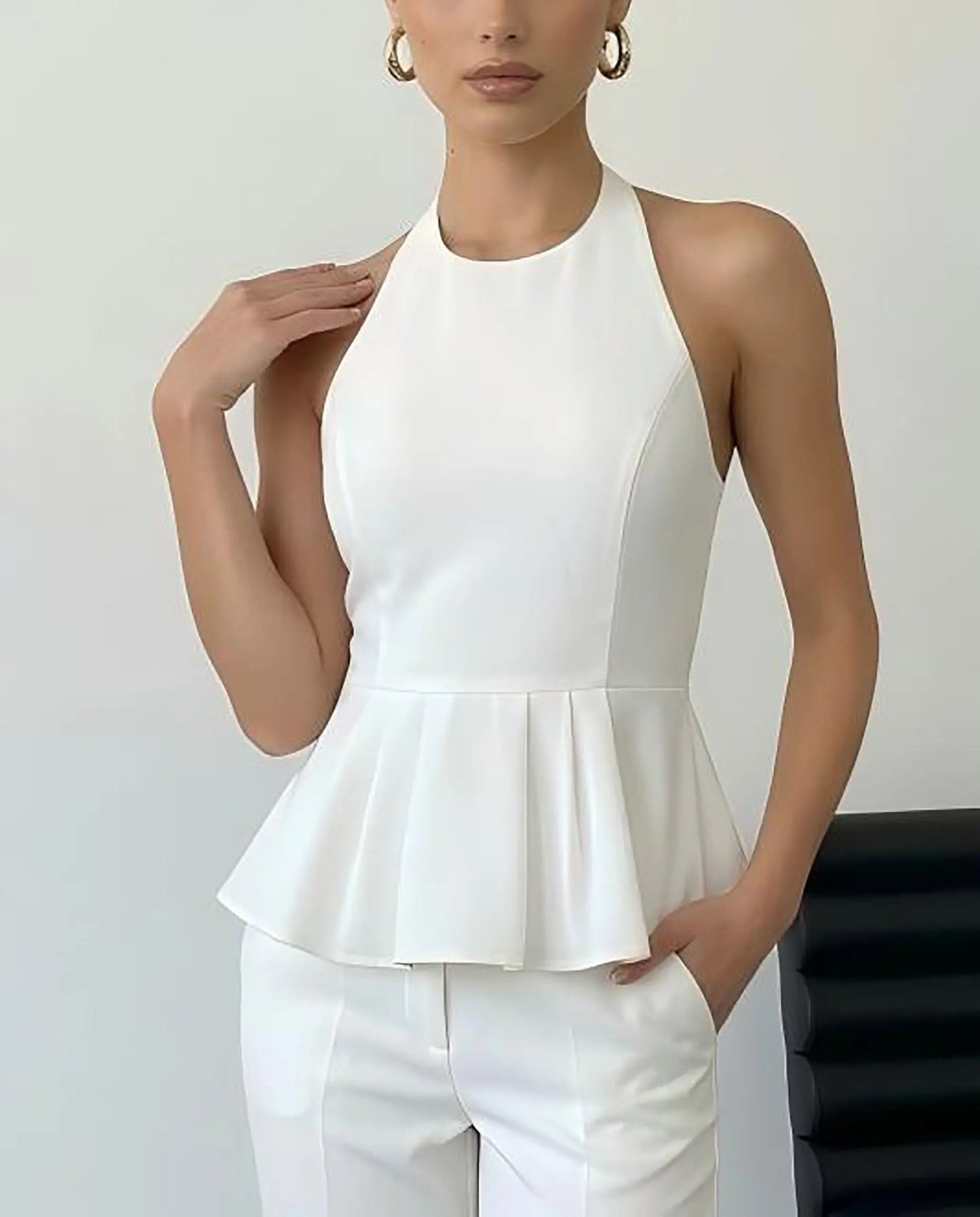 SOLACE  White Halter Neck Peplum Blouse?