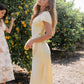 Austia Midi Dress in Yellow OMFORT