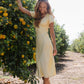 Austia Midi Dress in Yellow OMFORT