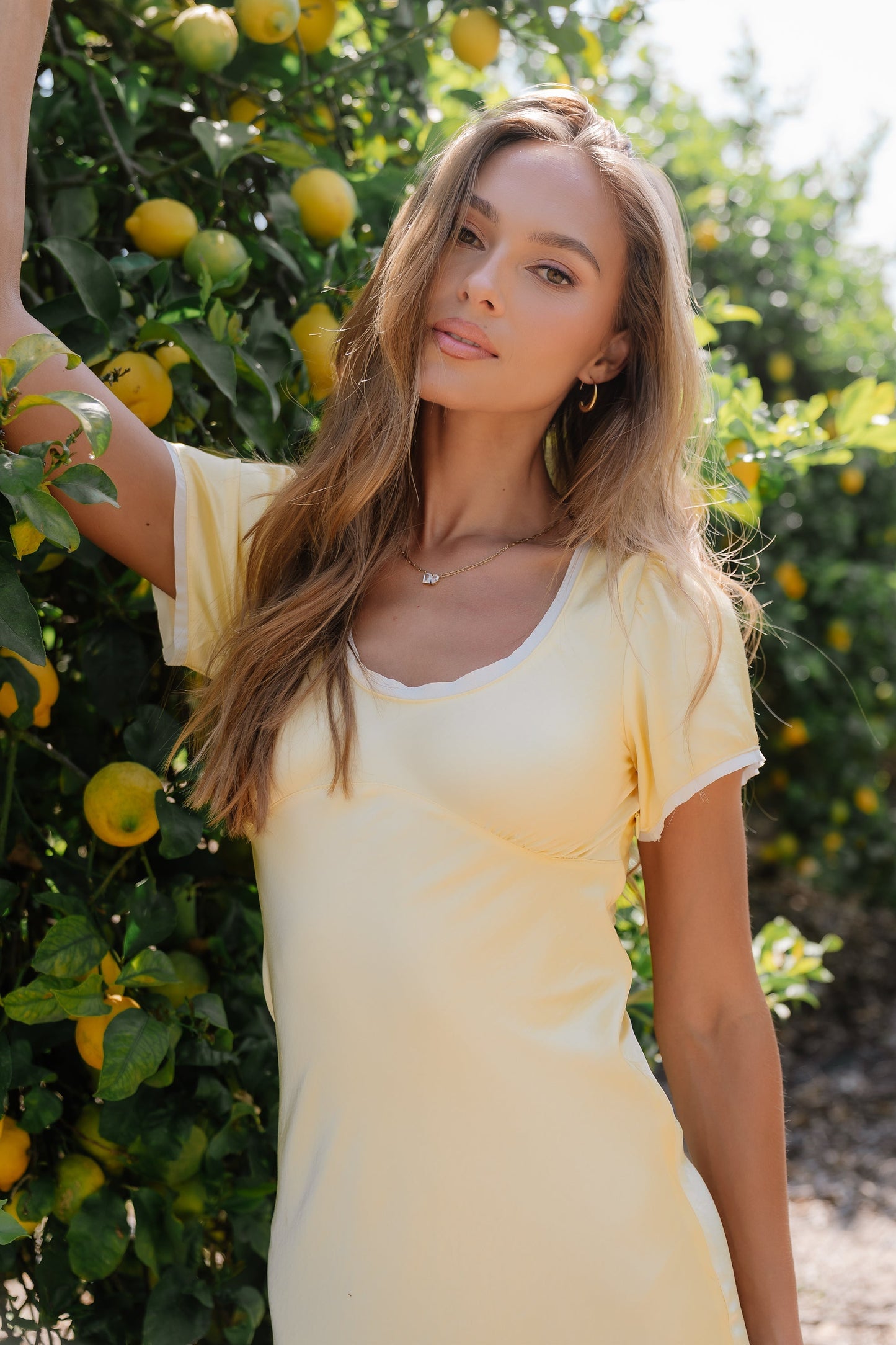 Austia Midi Dress in Yellow OMFORT