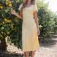 Austia Midi Dress in Yellow OMFORT