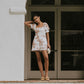 Mitsy Embroidered Floral Romper in Ivory OMFORT