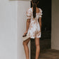 Mitsy Embroidered Floral Romper in Ivory OMFORT