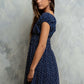 Kaelyn Floral Midi Dress in Midnight OMFORT
