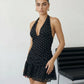 SOLACE  Black Polka Dot Halter Neck Ruffle Hem Mini Dress?