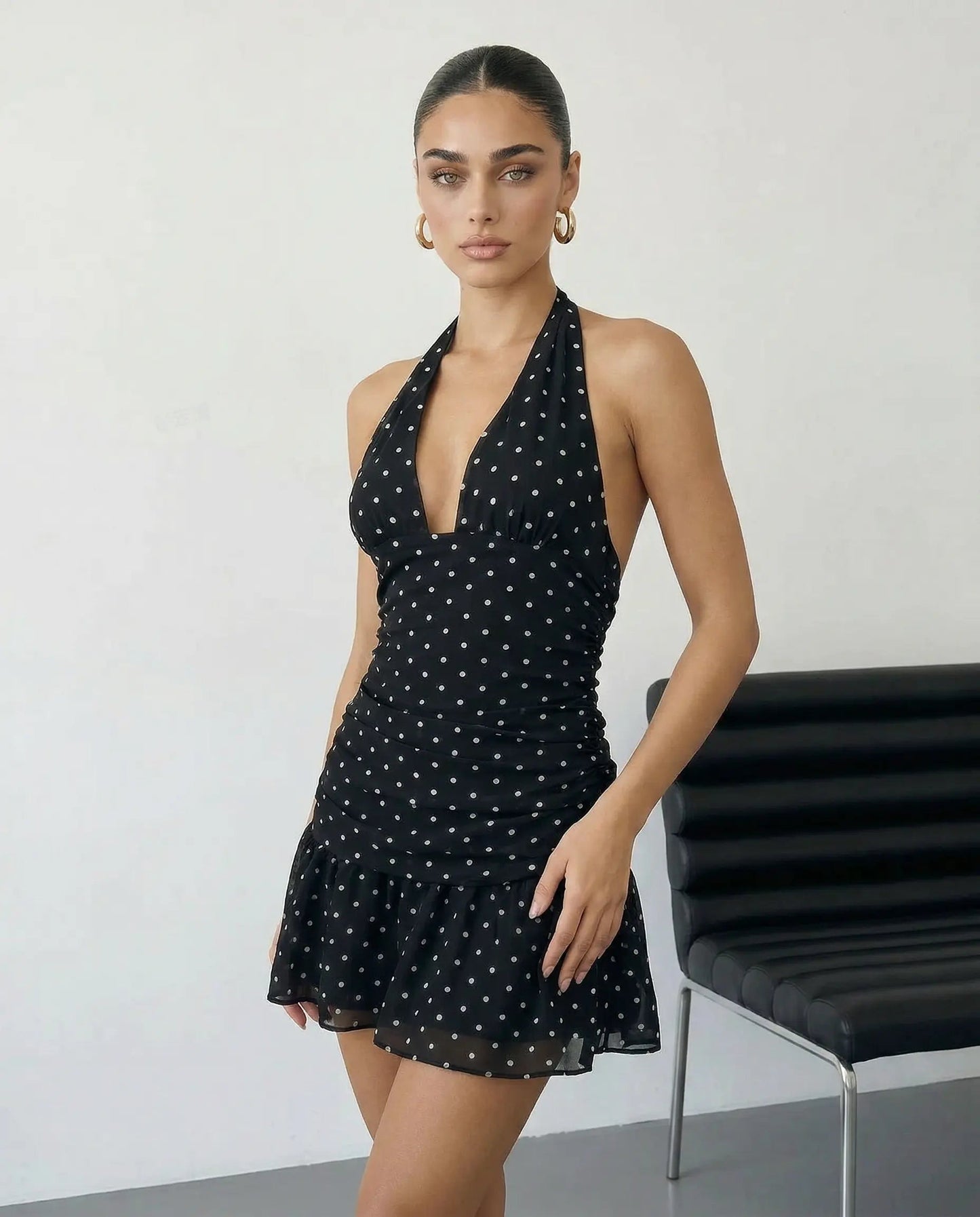 SOLACE  Black Polka Dot Halter Neck Ruffle Hem Mini Dress?