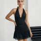 SOLACE  Black Polka Dot Halter Neck Ruffle Hem Mini Dress?
