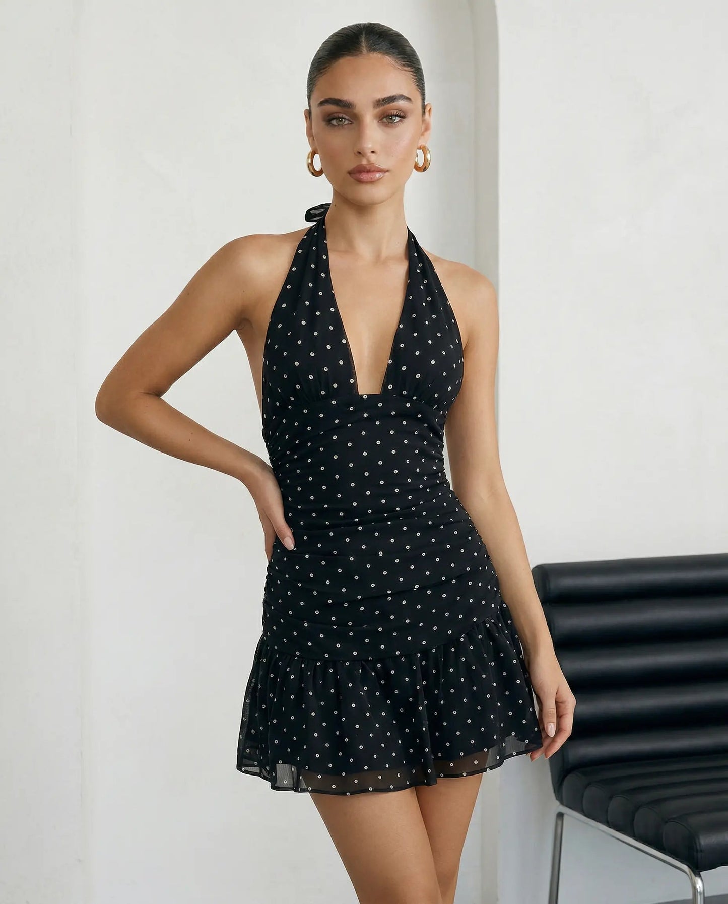 SOLACE  Black Polka Dot Halter Neck Ruffle Hem Mini Dress?
