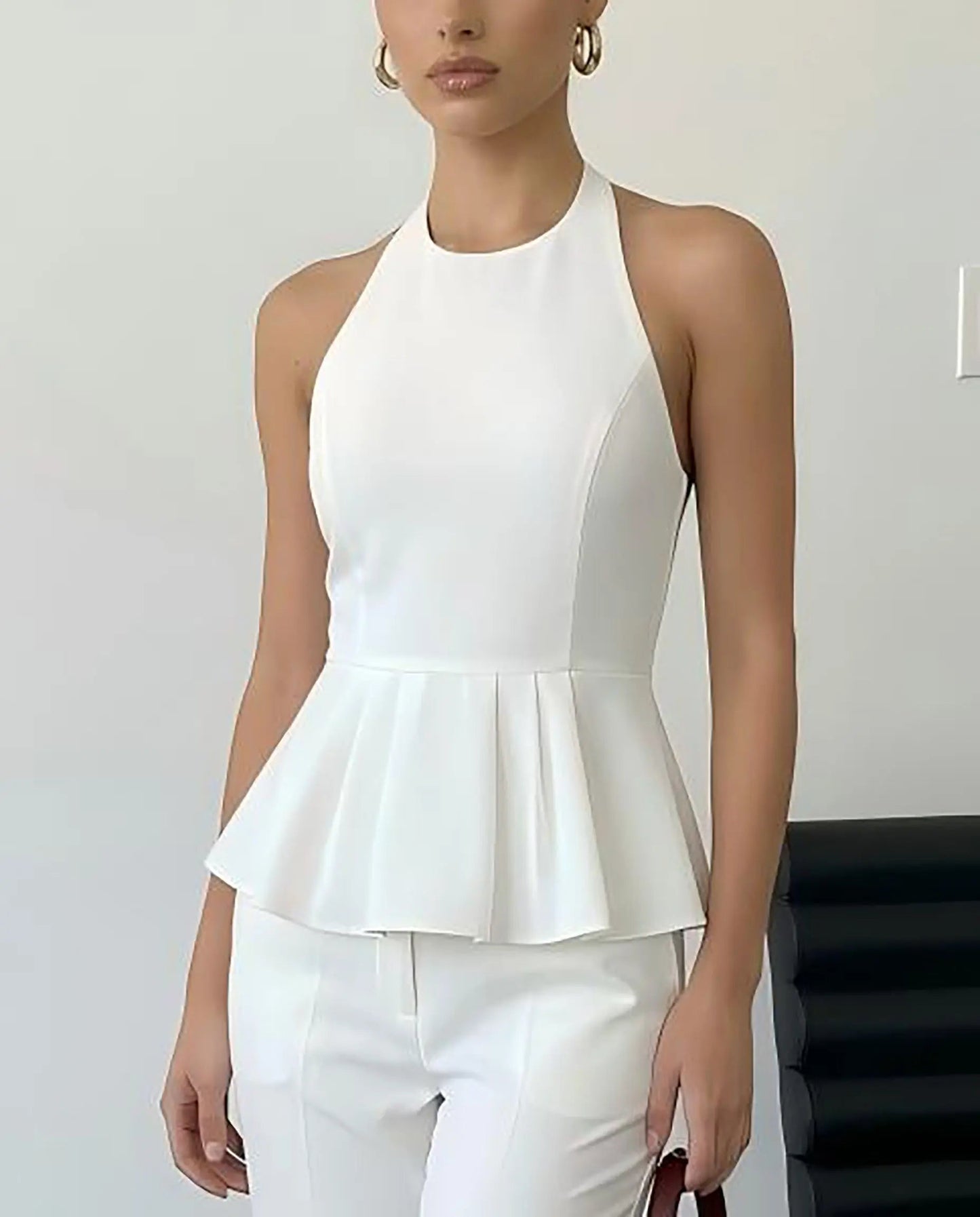 SOLACE  White Halter Neck Peplum Blouse?