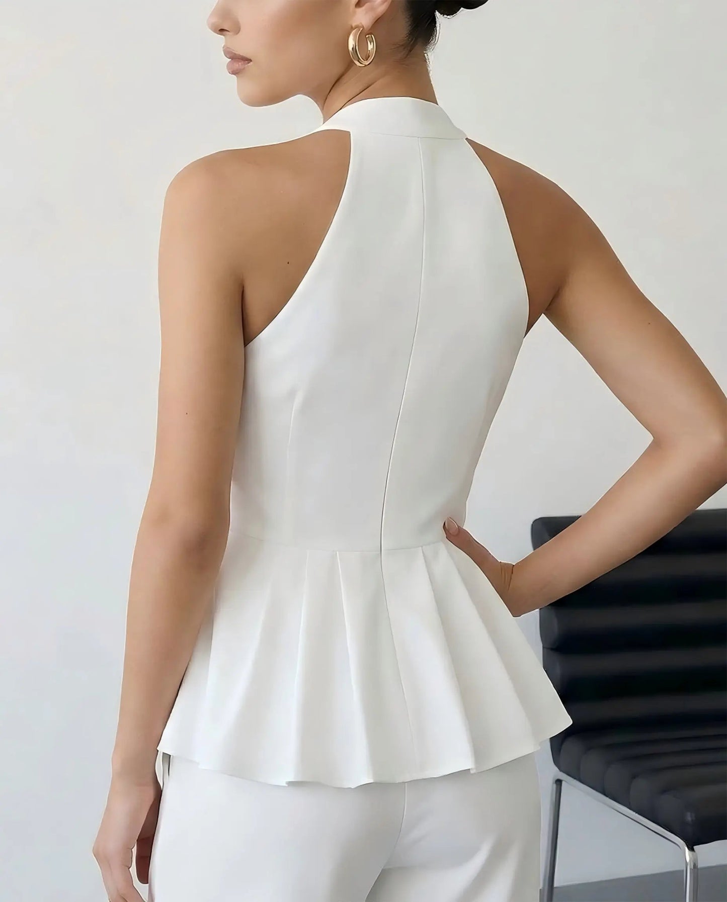 SOLACE  White Halter Neck Peplum Blouse?