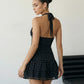 SOLACE  Black Polka Dot Halter Neck Ruffle Hem Mini Dress?