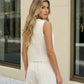 SOLACE  White Sleeveless Vest And Shorts Set?