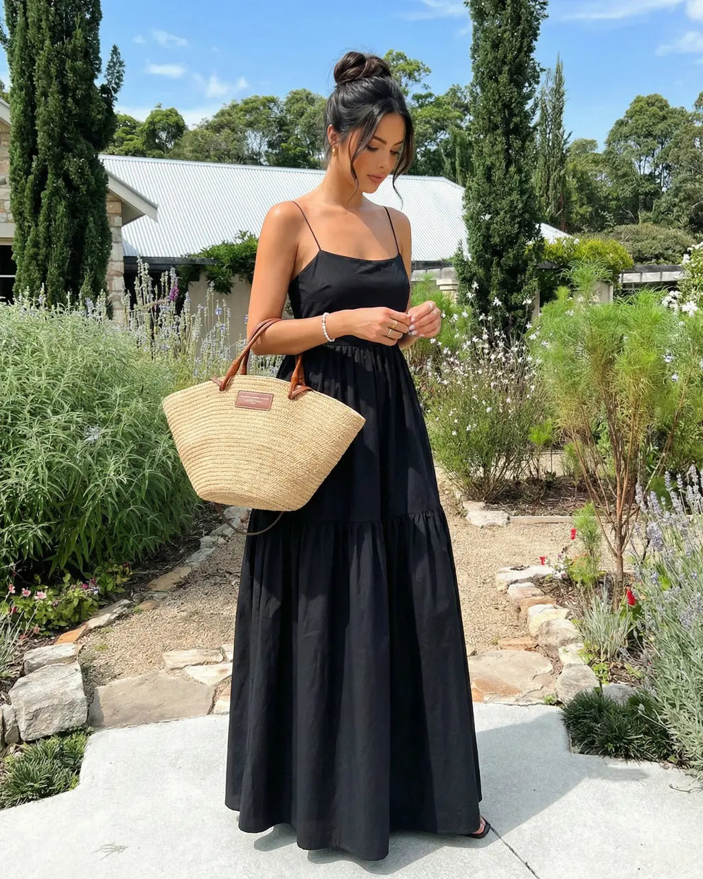 SOLACE  Black Sleeveless Backless Tiered Maxi Dress?