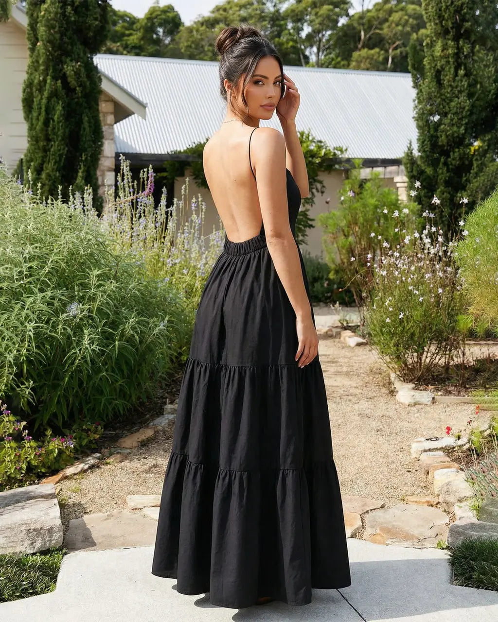 SOLACE  Black Sleeveless Backless Tiered Maxi Dress?