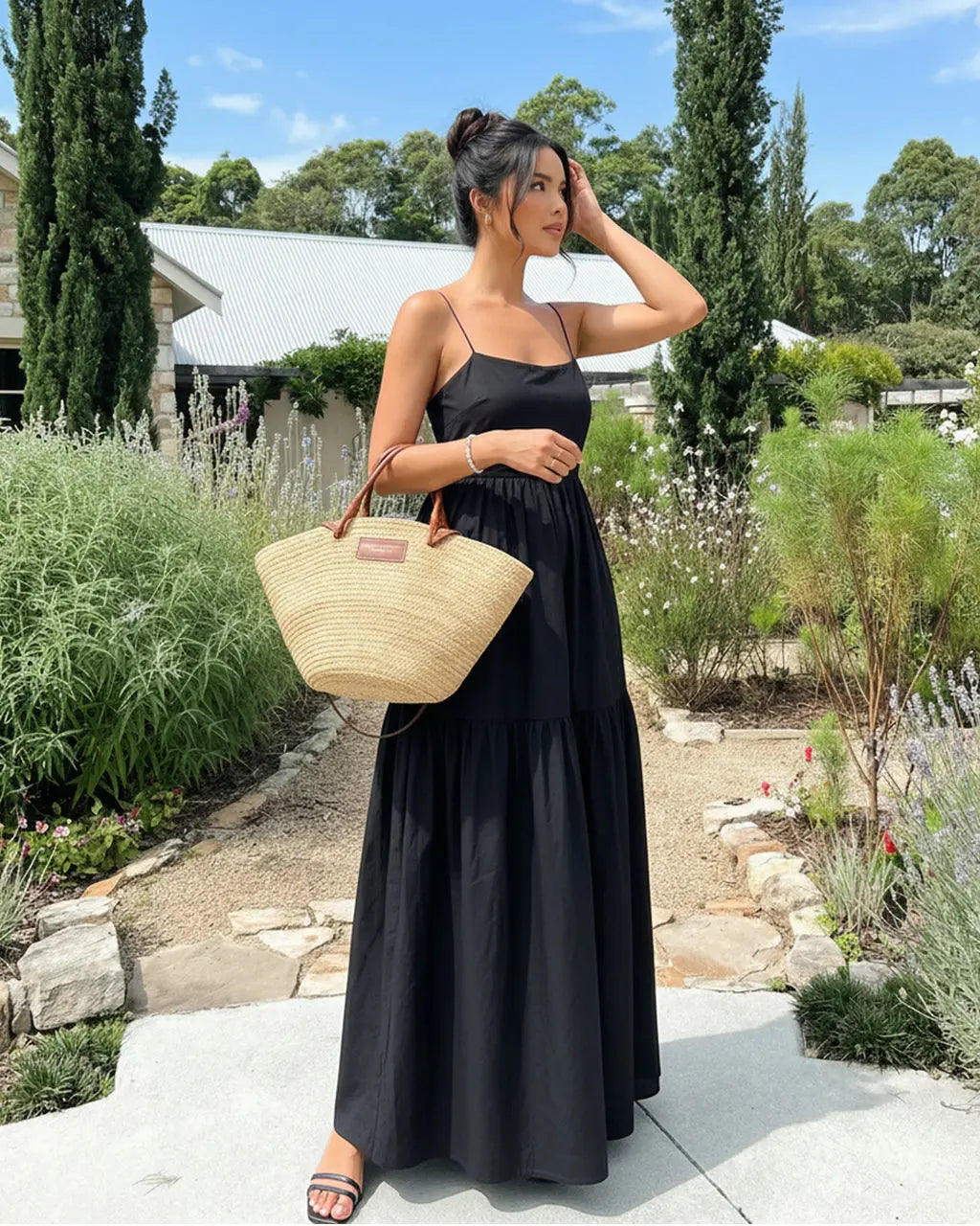 SOLACE  Black Sleeveless Backless Tiered Maxi Dress?