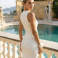 SOLACE  White Textured V-Neck Sleeveless Top Maxi Skirt Set?