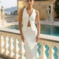 SOLACE  White Textured V-Neck Sleeveless Top Maxi Skirt Set?