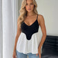SOLACE  Black White Color Block Peplum Camisole Top?