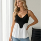 SOLACE  Black White Color Block Peplum Camisole Top?