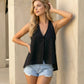 SOLACE  Black V-Neck Halter Tie Back Cami Top?