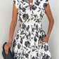 White and Black Floral Print Smocked Midi Dress OMFORT
